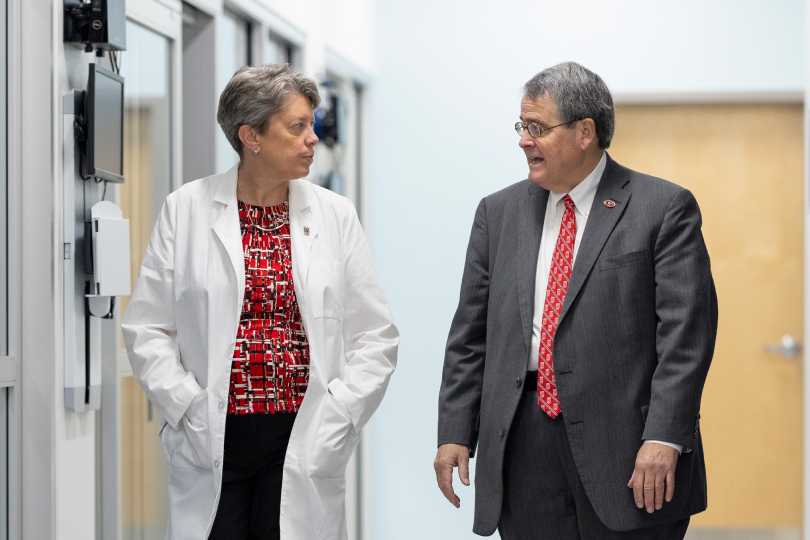 Dr. Nuss and President Moorhead walking and talking on UGA's campus