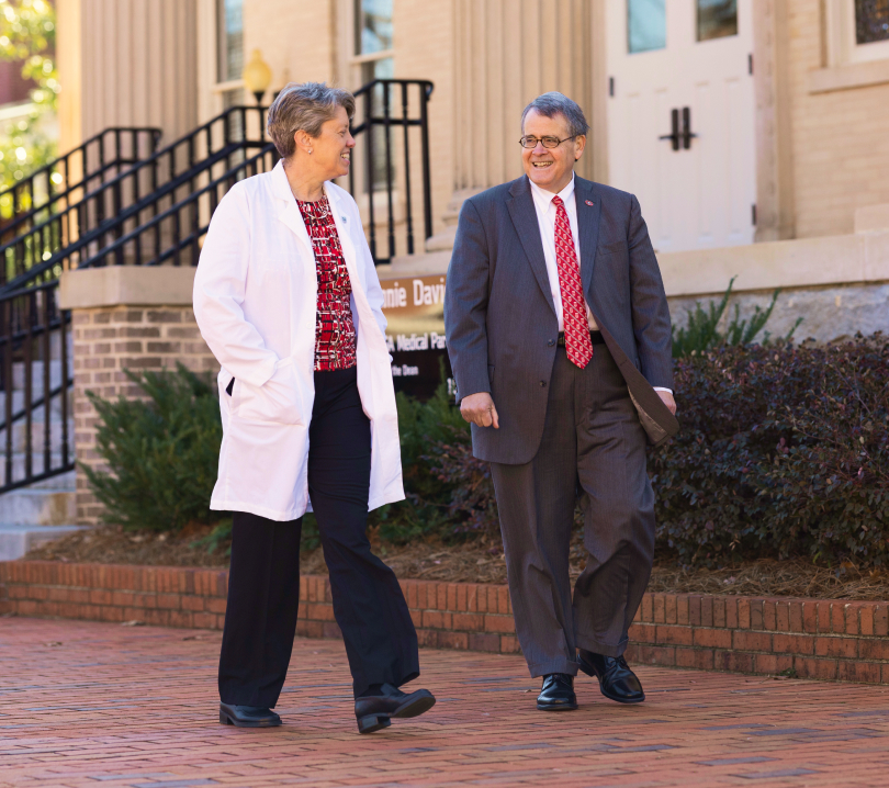 Dean Nuss and President Moorehead walking on campus